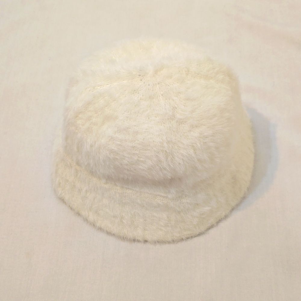 URBAN OUTFITTERS FUZZY BUCKET HAT.